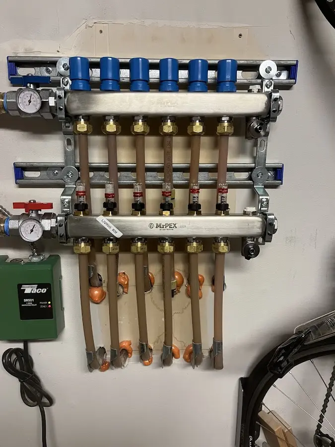 Plumber performing Gas Leak Detection at a residential property in New Baltimore